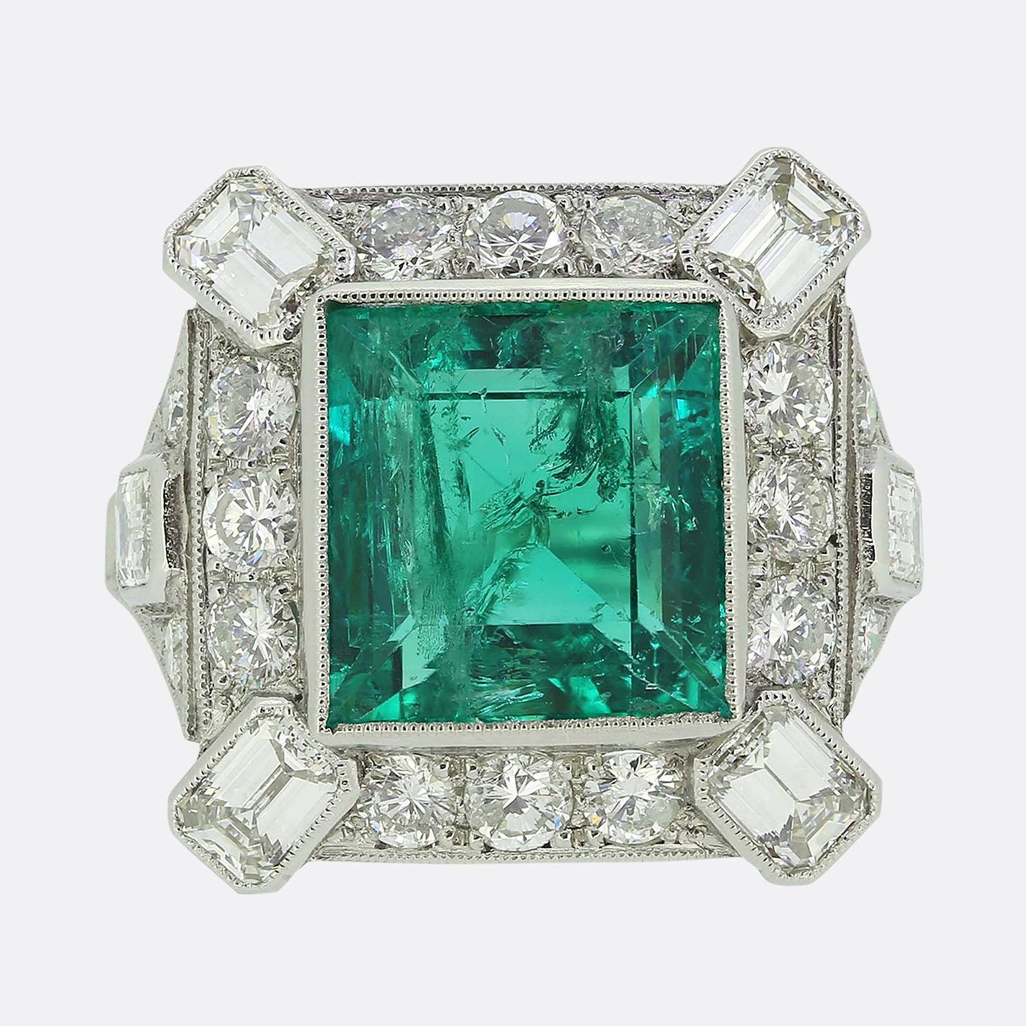 Vintage 4.34 Carat Emerald and Diamond Cluster Ring