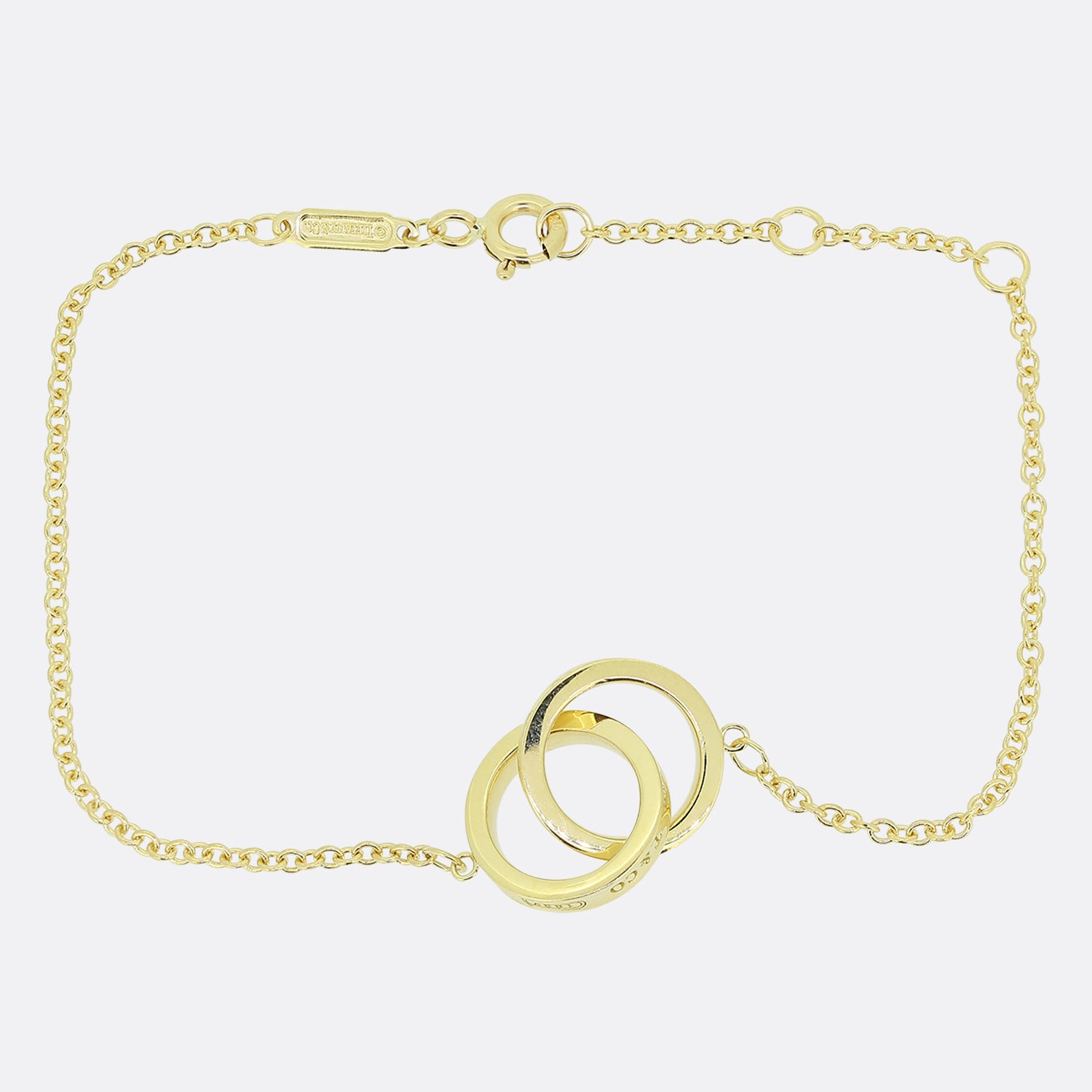 Tiffany & Co Interlocking Bangle Bracelet 18k Yellow Gold 7.25