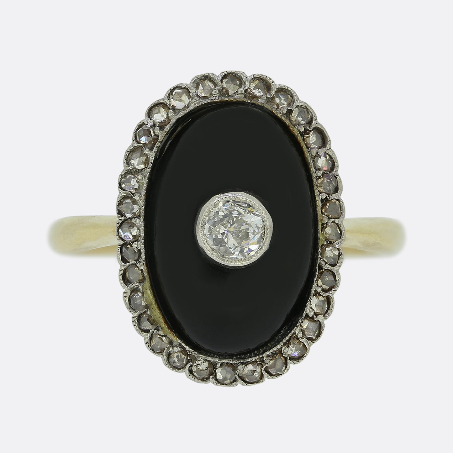 Antique 0.20 Carat Diamond and Onyx Ring
